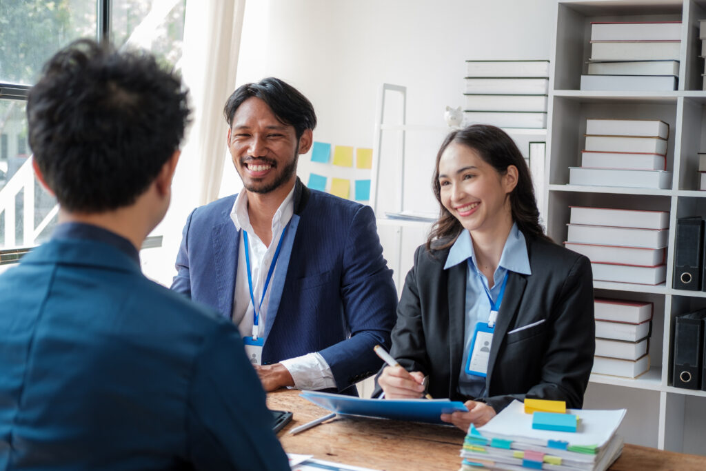 Two newly-hired professional for sales representative job positions.